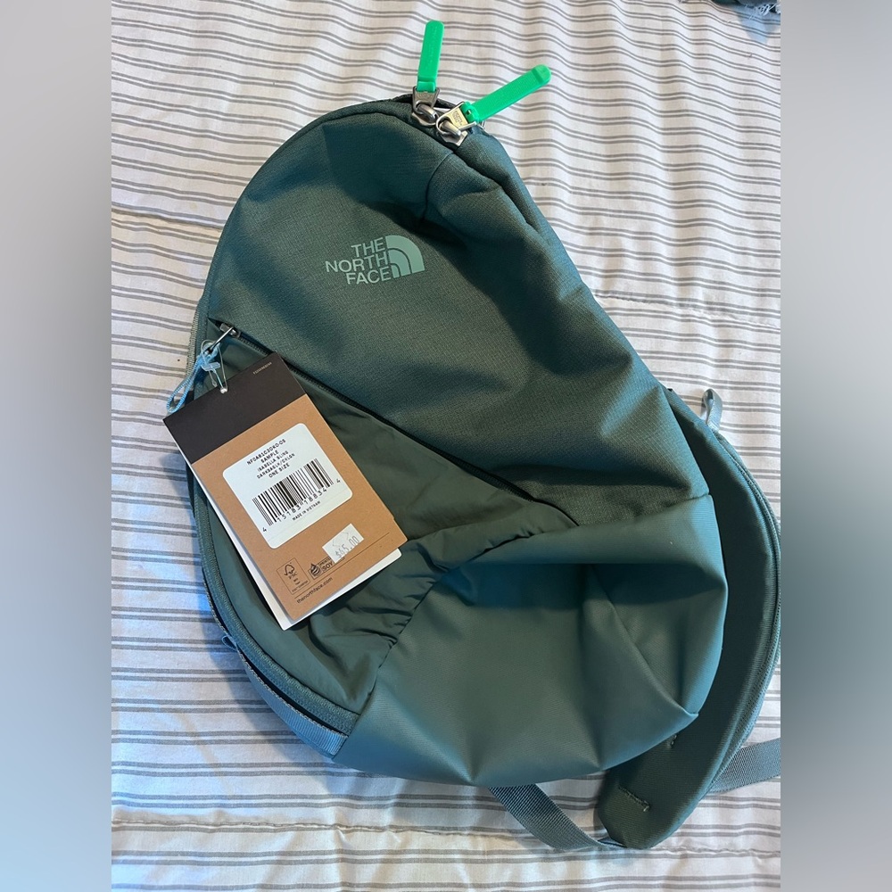 The North Face Green Backpack Durable Outdoor Essential
